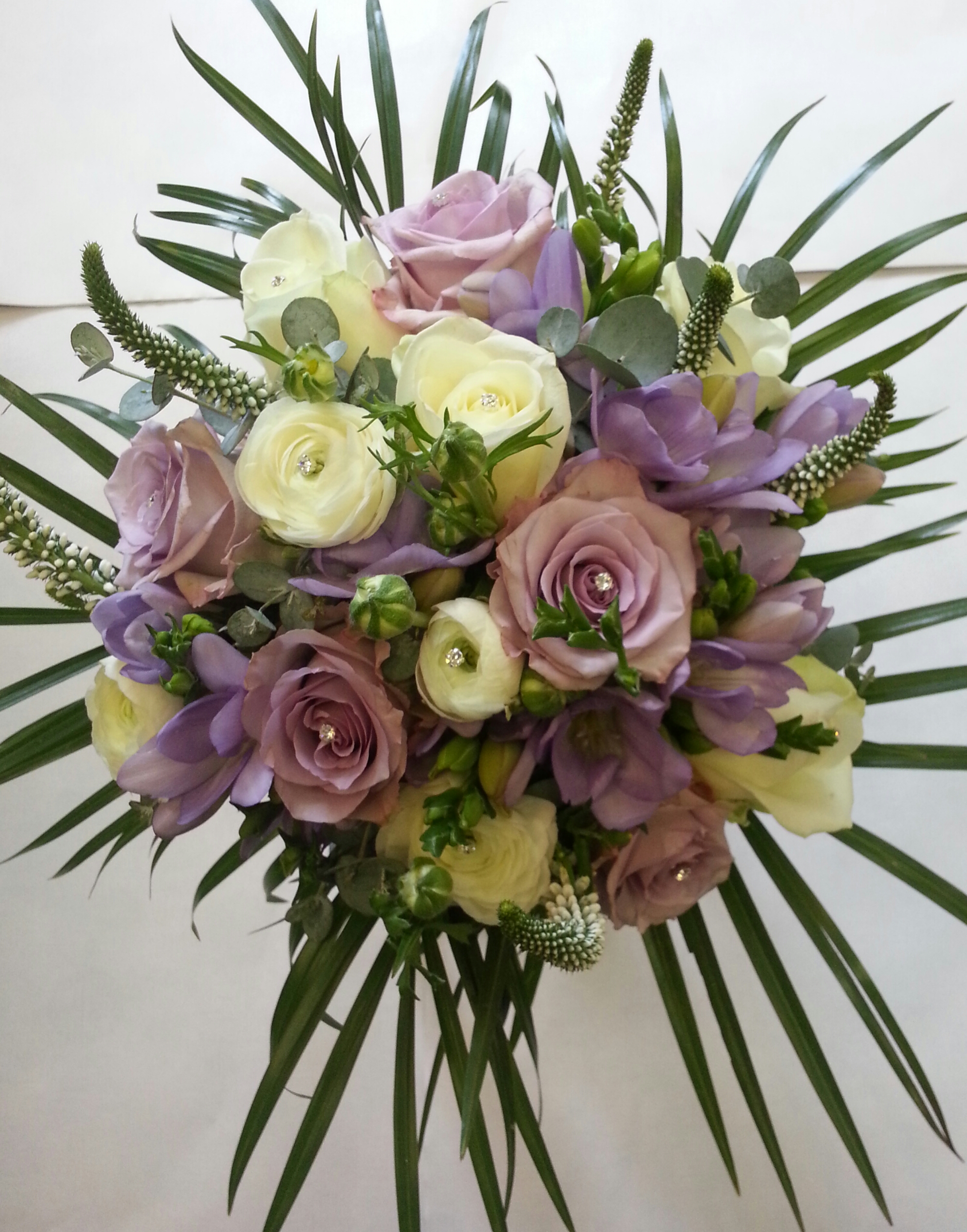 Eileen Jenkins rose and freesia ivory and lilac bouquet