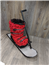 Eileen Jenkins Ski boot, ski and pole