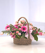 Wicker Basket Of Fresh Flowers