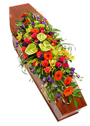 vibrant modern casket spray