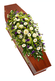 purple and white casket spray